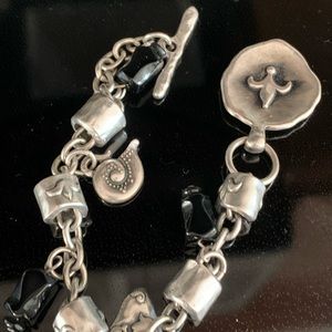 Charming bracelet. Great toggle clasp..Silver and black⚜️⚜️